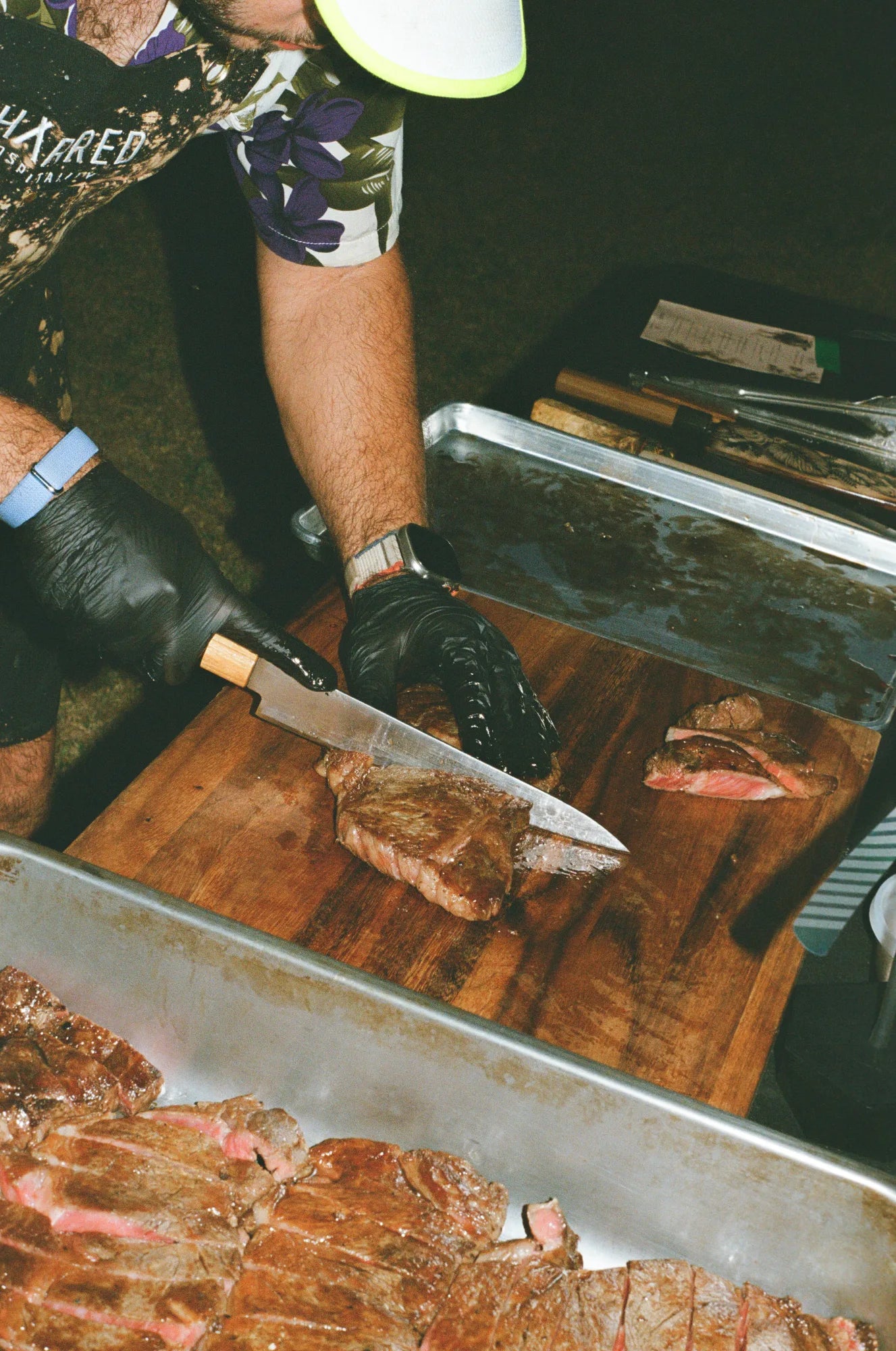 Slicing a grilled NY strip